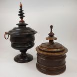 A Dutch treen tobacco jar and cover, 30 cm high, and another similar, 18 cm high Tallest one lacks a
