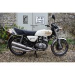 A 1976 Kawasaki KH250 Registration number LYU 693P Engine number CIE042592 Last taxed 1994 Barn