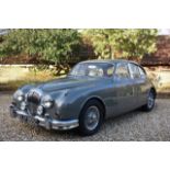 A 1965 Daimler V8 250 Registration number DYJ 955C V5C Gun metal with a maroon leather interior