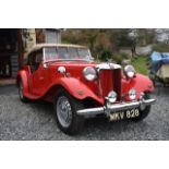 A 1953 MG TD Registration number MKV 828 Chassis number TD/28408 Engine number TD2/28446 Red with