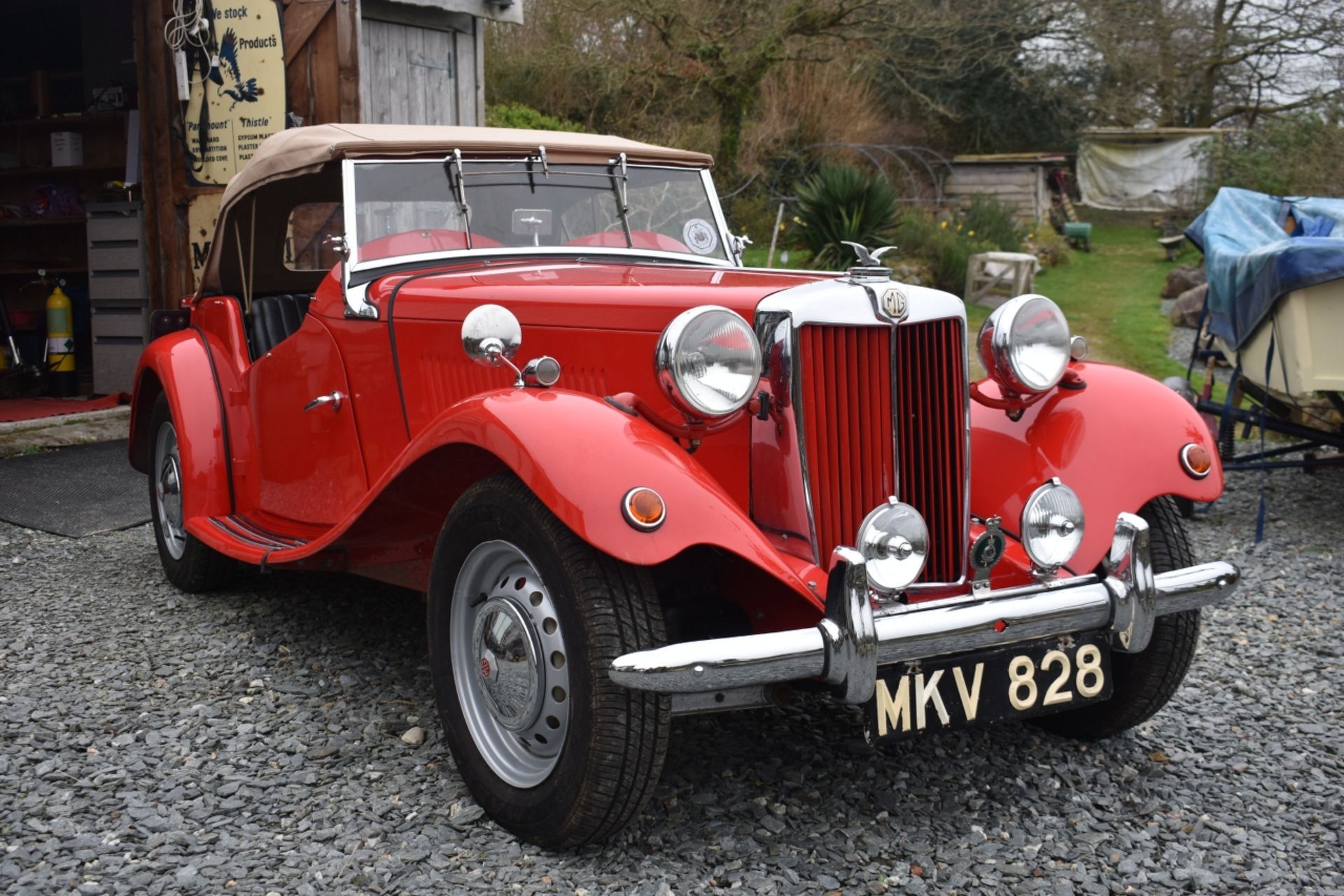 A 1953 MG TD Registration number MKV 828 Chassis number TD/28408 Engine number TD2/28446 Red with