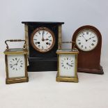 A carriage clock, striking on a gong, in a brass case, 15 cm high, a carriage timepiece and two