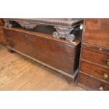 A large 18th century oak coffer, on bracket feet, with a later zinc liner, 184 cm wide