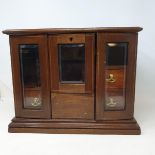An Edwardian inlaid mahogany smokers cabinet, 37.5 cm wide