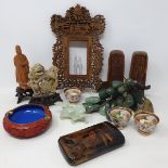 A Tibetan prayer wheel, a Chinese carved wood photo frame, a bunch of hardstone grapes and other