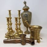 An Indian brass vase and cover, 36 cm high, four pairs of brass candlesticks, and other