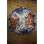 A Japanese Imari shallow bowl, chipped, 30 cm diameter, two Royal Doulton figures, a silver and