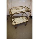 An Art Deco style trolley, the tubular frame with a lift out tray top, 66 cm wide by RB pitted