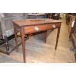 An early 19th century mahogany table, with a frieze drawer, on tapering square legs, 90 cm wide