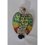 A silver plique-a-jour eagle brooch set with sapphire, ruby, marcasites and coloured enamel