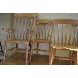 A pair of Windsor style kitchen armchairs, with a matching set of seven single chairs (9)