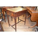 A 19th century mahogany table, the hinged top inset a leather panel on an adjustable strut