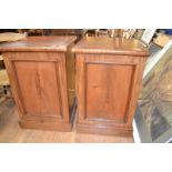 A pair of mahogany pedestal cabinets, on plinth bases, 52 cm wide