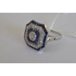 A large platinum Victorian style sapphire and diamond cluster ring. Sapphires: approx. 1.25ct,