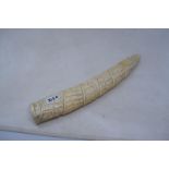 A late 19th/early 20th century Congolese ivory tusk, carved figures in a procession, 44 cm cracks