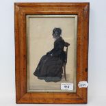 English school, mid 19th century, a tinted silhouette of a seated lady, 22 x 13.5 cm, in a