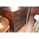 An Edwardian mahogany chest, of five drawers, 107 cm wide, a display cabinet, an oak upright bureau,