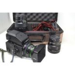 A Bromica Zenza AE-II camera, with lenses, in a case