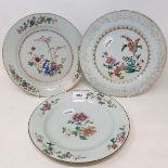 A set of four Chinese porcelain famille rose plates, of shaped circular form, decorated flowers