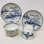 Two 18th century Worcester porcelain cannonball pattern tea bowls and saucers and a desk stand,