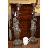 A pair of late Victorian/Edwardian bronze figural lamps, 60 cm high (over fitments)