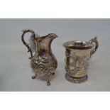 A Victorian silver christening mug, with embossed decoration, and a similar silver plated cream