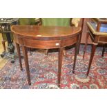 A 19th century mahogany D shape tea table, crossbanded in kingwood, on tapering square legs with