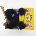 A Pelham puppet, Black Poodle, in original yellow box
