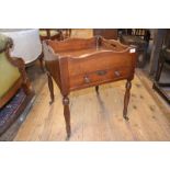 A 19th century mahogany tray top low table, having a draw, on turned legs, 48 cm wide