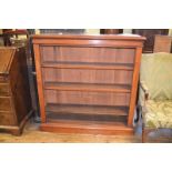 A late Victorian mahogany open bookcase, on a plinth base, 120.5 cm wide