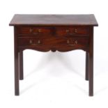 A George III mahogany low boy, with cable inlay, having two short and one long drawer, on