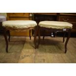 A pair of French stools, on cabriole legs (2) By RN Needing upholstery, wormed, repaired