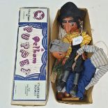 A Pelham puppet, Pirate, and another puppet, in a brown box (2)
