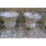 A pair of reconstituted stone garden urns, 40 cm high x 51 cm high, and two terracotta garden