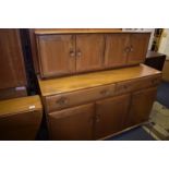 An Ercol elm sideboard, 136 cm wide From a local deceased estate, generally good, would benefit from