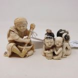 A Japanese carved ivory group, in the form of a family of five women and children washing, 3 cm