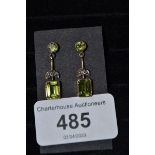 A pair of 9ct gold and emerald cut peridot drop earrings Good condition Modern