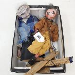 A handmade puppet, an old lady and an old man
