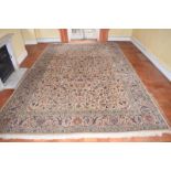 A large Kashan carpet, decorated flowers and animals, approx. 547 x 362 cm Generally good,