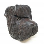 A Black Forest style carved wood tobacco jar, in the form of a dog's head, 19 cm high