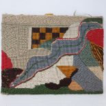 A small woolwork panel, possibly by Ann Graves, an abstract design, 24 x 31 cm, and another