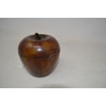 A painted treen tea caddy, in the form of an apple, 11.5 cm high Report Modern