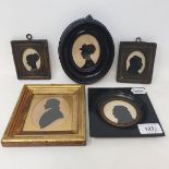A 19th century bronze tinted silhouette, of a gentleman, 8.5 x 7 cm, oval, and four other