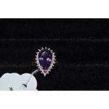 A 9ct gold pear shaped amethyst and diamond ring, approx. ring size N