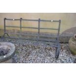 A Victorian style iron three seater garden bench, 152 cm wide From a local deceased estate where