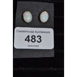 A pair of 9ct gold and gilson opal earrings