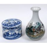 A Chinese vase, of baluster form, decorated figures in a punt, dwellings, trees and mountains in
