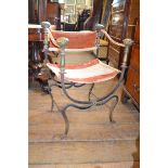 A 17th century style Italian brass and iron 'throne' chair fabric faded, loose and worn, some