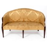 A George III style upholstered two seater settee, on tapering square front legs, 146 cm wide See