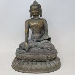 A brass Buddha, 27.5 cm high